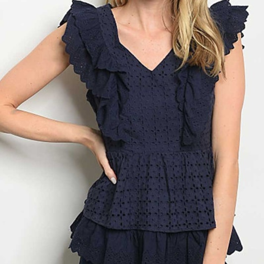 Sleeveless ruffled eyelet navy blouse